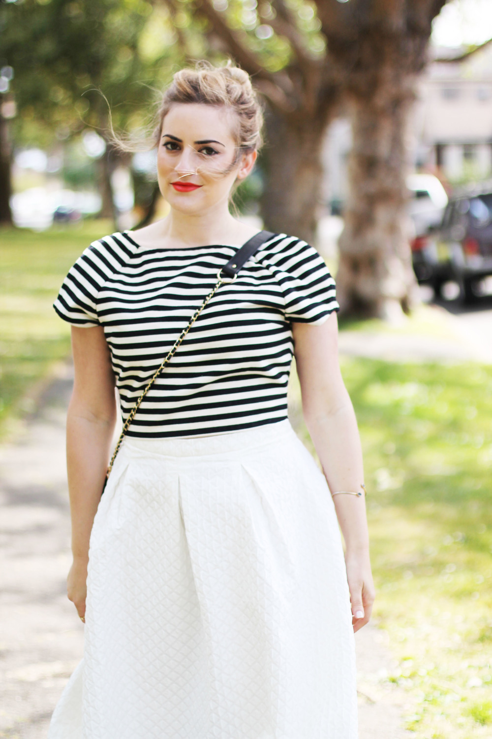 a walk in the park wearing a midi skirt